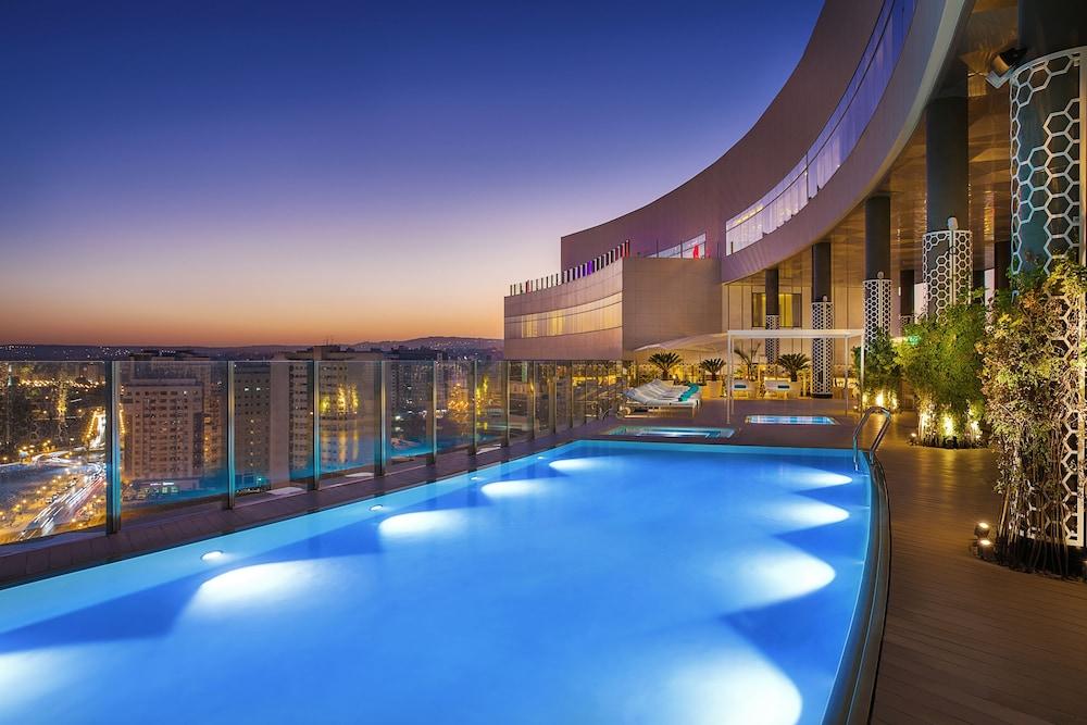 Hilton Tanger City Center Exterior photo The pool at the 360° Sky Lounge
