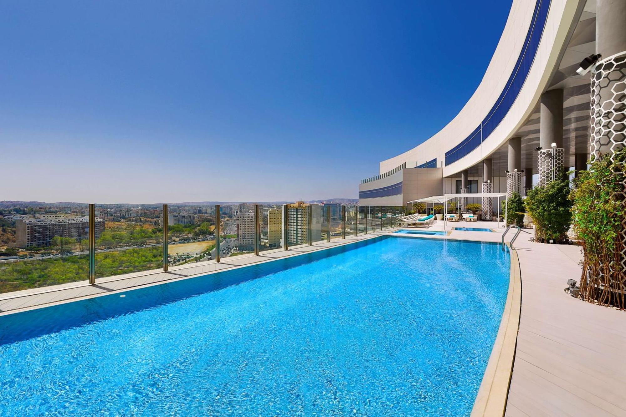 Hilton Tanger City Center Exterior photo Skyline Residences